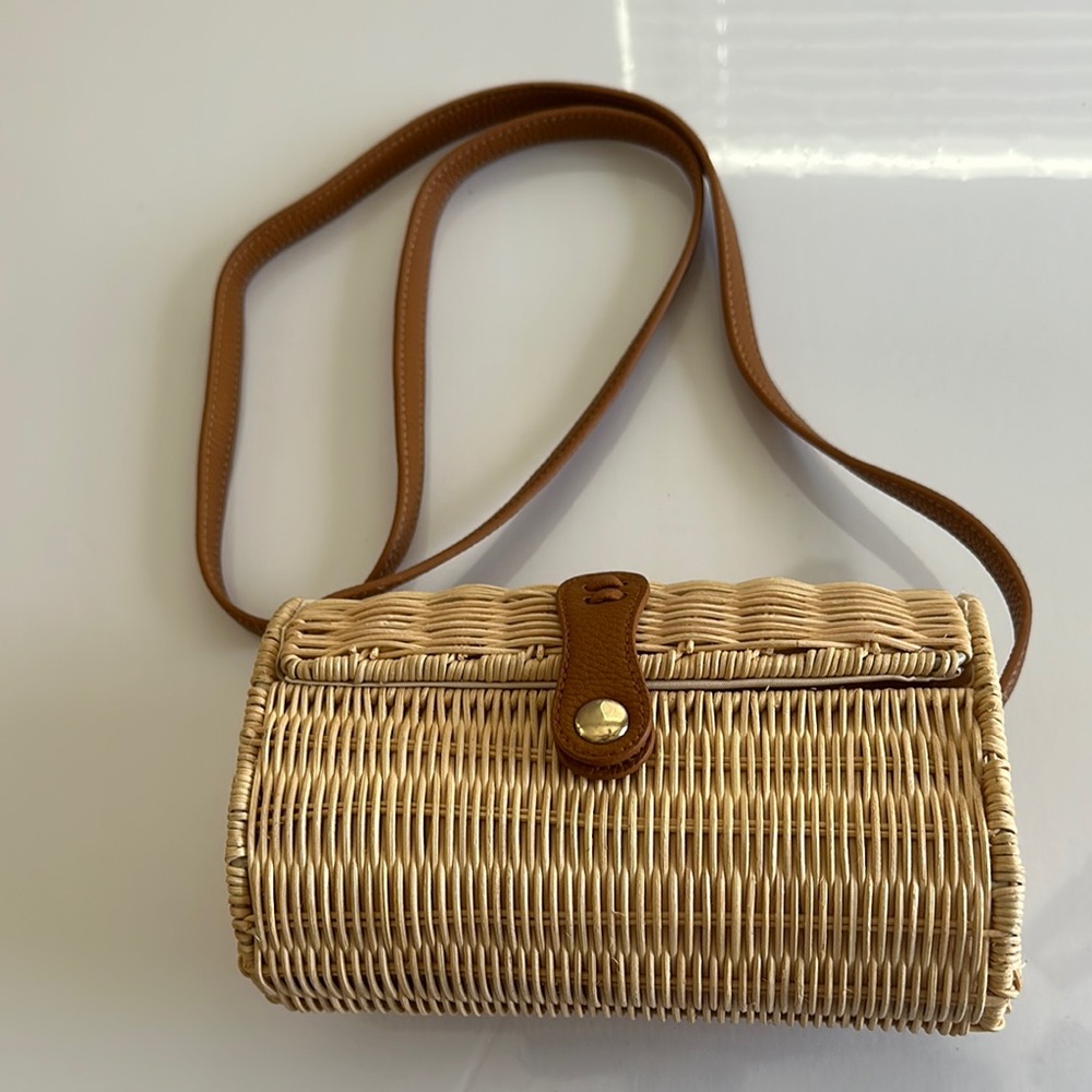 Express straw bag. In new condition only worn once.